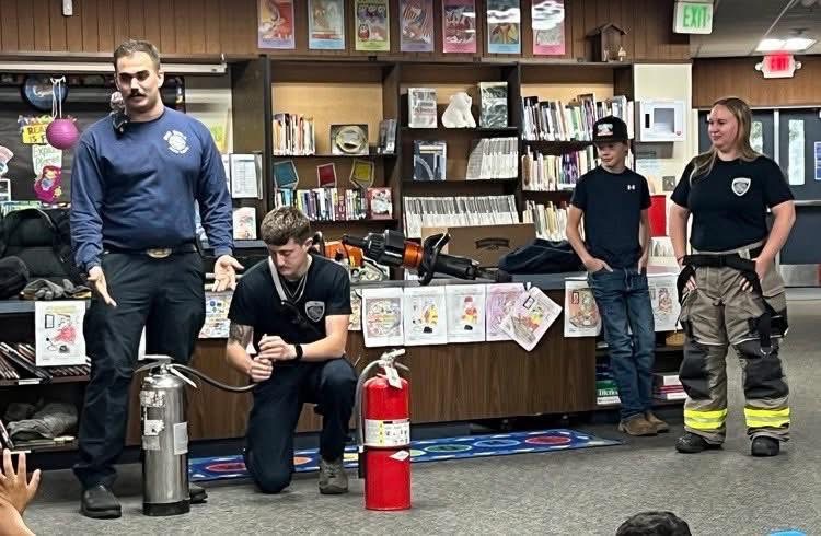 RDFPD Volunteers go to local schools to talk about Fire Safety. Volunteer Fire Fighters showing students at local schools how to use a fire extinguisher